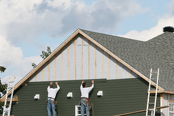 Professional Storm Damage Siding Repair technician working in Washington Boro, PA